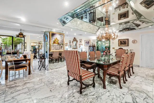 a large bedroom with a large bed and a large window