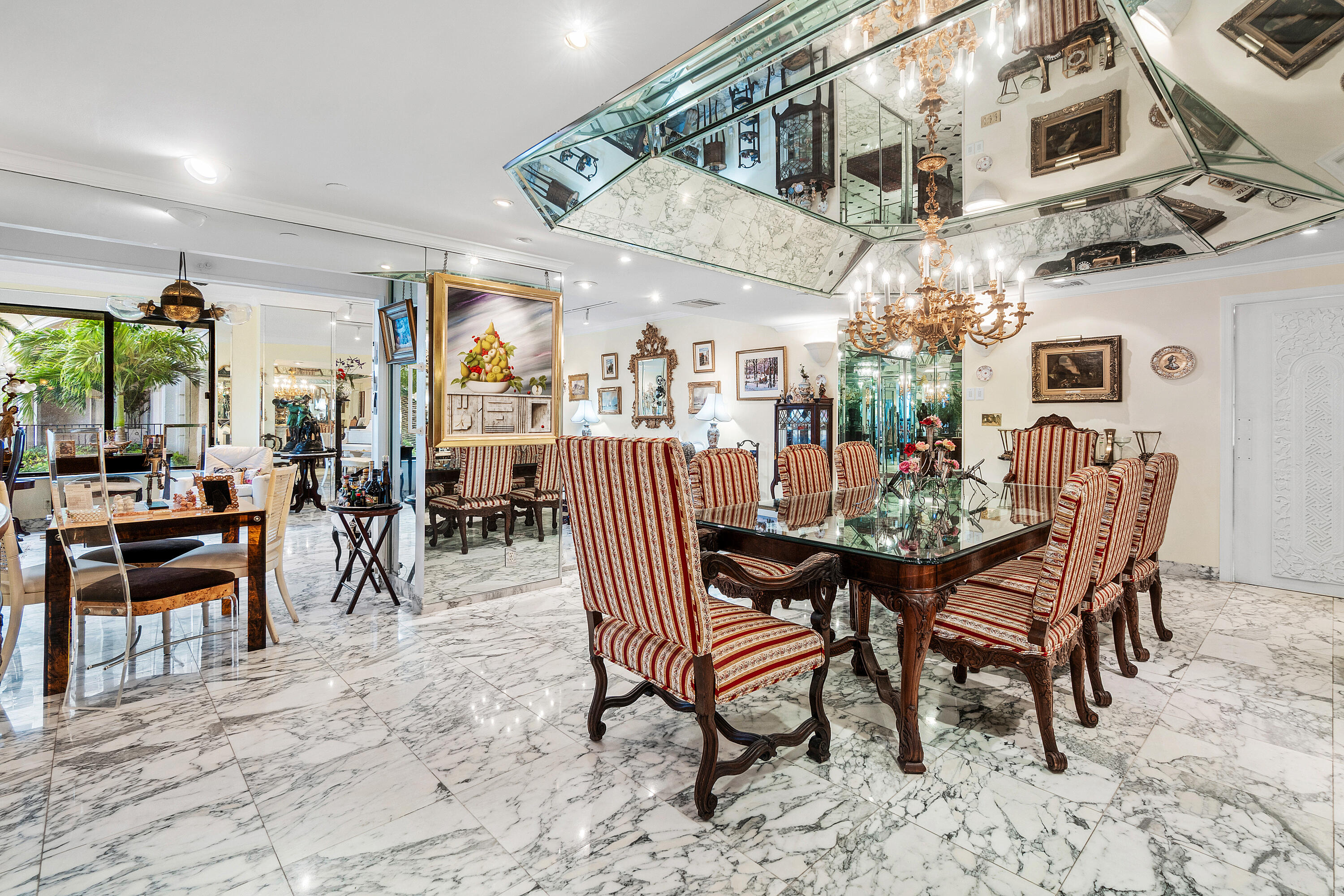 150 Bradley Place, Unit 101 Palm Beach, FL 33480 - Photo 23 of 38 a view of a dining room with furniture
