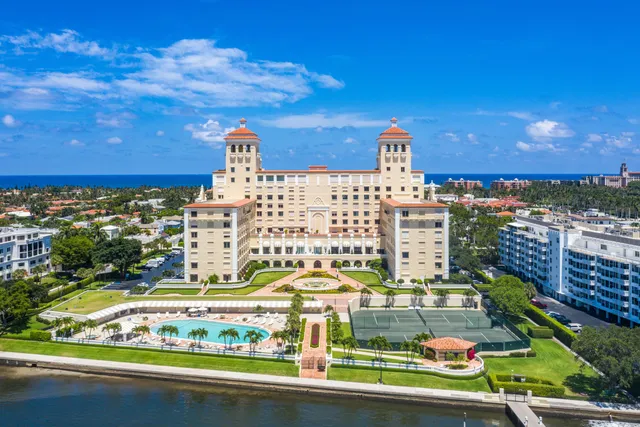 a living room with lots of furniture and a rug