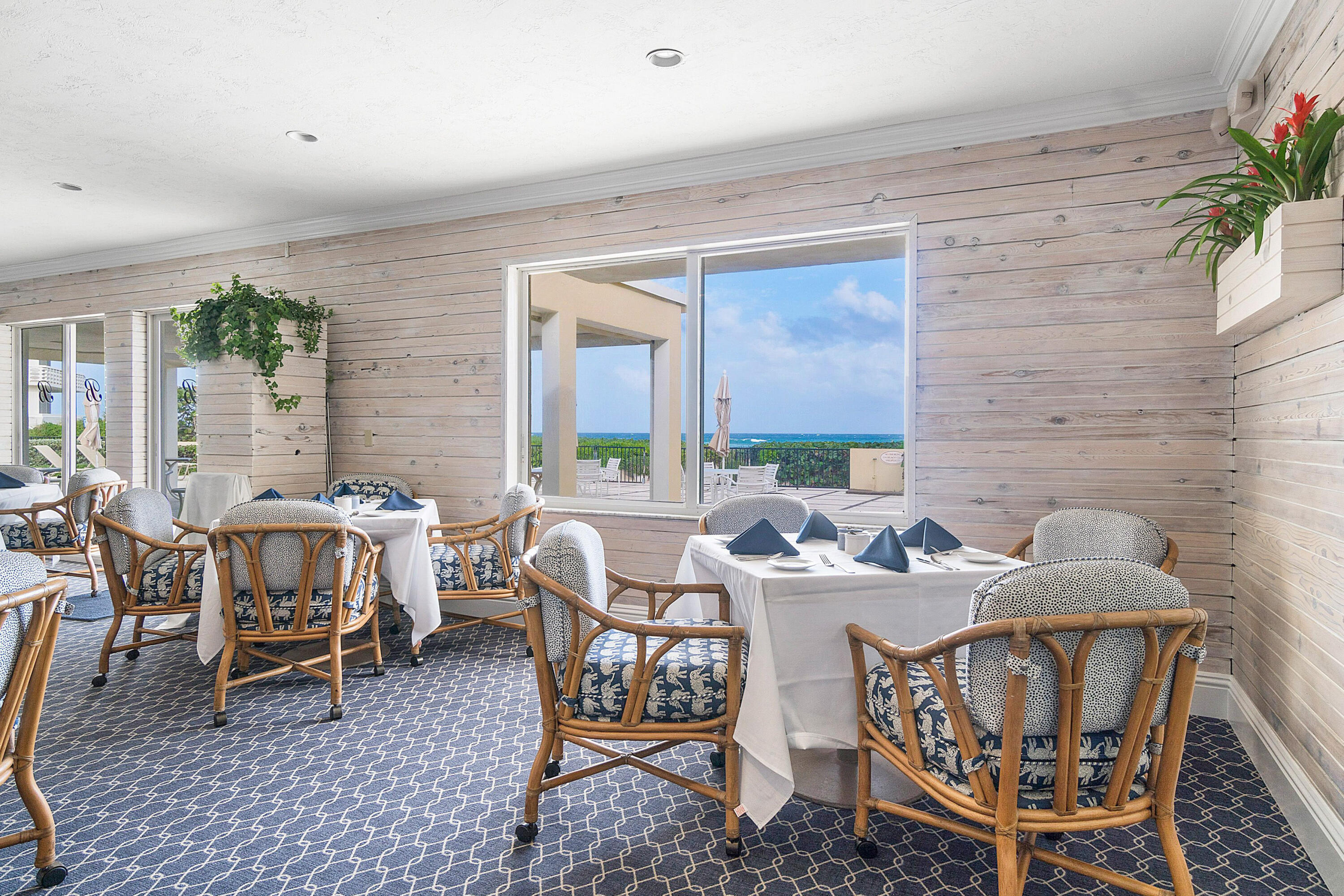 150 Bradley Place, Unit 101 Palm Beach, FL 33480 - Photo 33 of 38 a view of a dining room with furniture