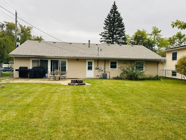 a front view of a house with swimming pool
