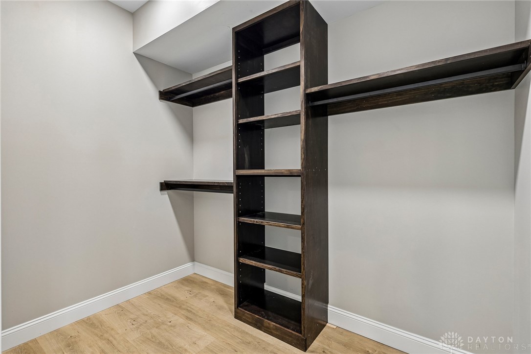 3906 Edwards Road, Unit C Cincinnati, OH 45209 - Photo 29 of 46 This organized walk-in closet offers convenient storage and easy access to all your essentials.