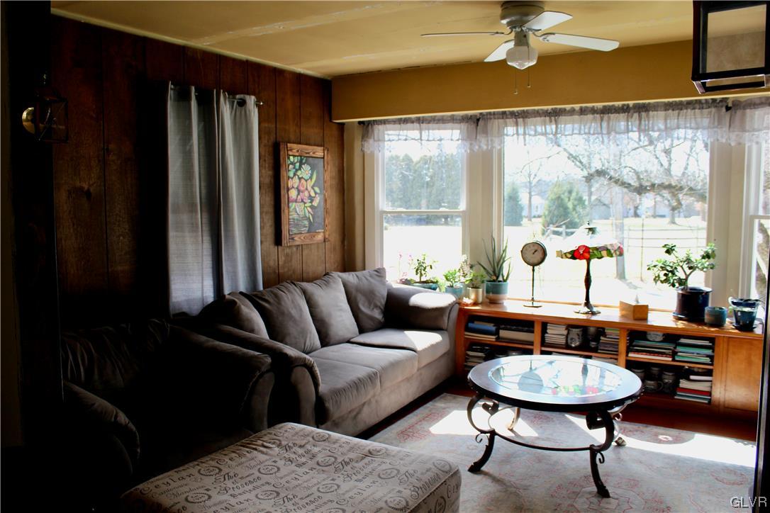560 Cherry Hill Road Nazareth, PA 18064 - Photo 13 of 48 a living room with furniture and a large window