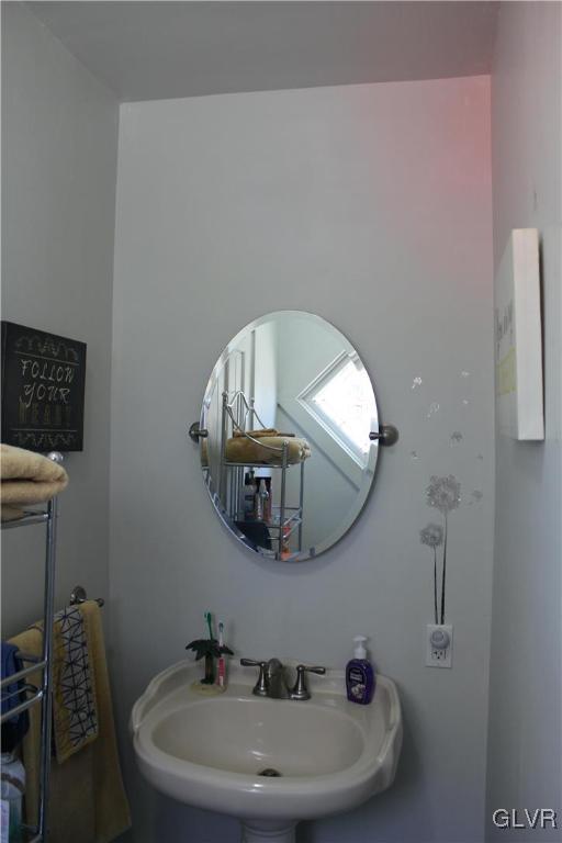 560 Cherry Hill Road Nazareth, PA 18064 - Photo 19 of 48 a bathroom with a sink and a mirror