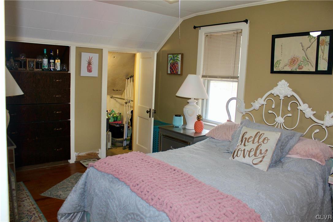 560 Cherry Hill Road Nazareth, PA 18064 - Photo 23 of 48 a bedroom with a bed and lamp