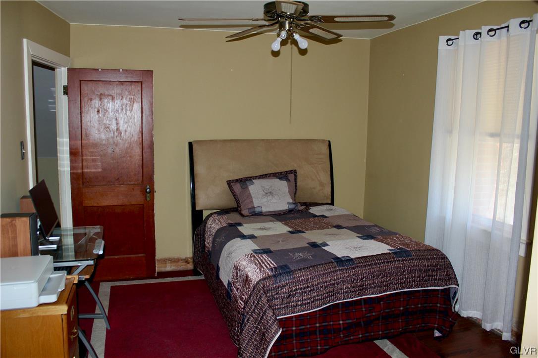 560 Cherry Hill Road Nazareth, PA 18064 - Photo 26 of 48 a bedroom with a bed and a mirror