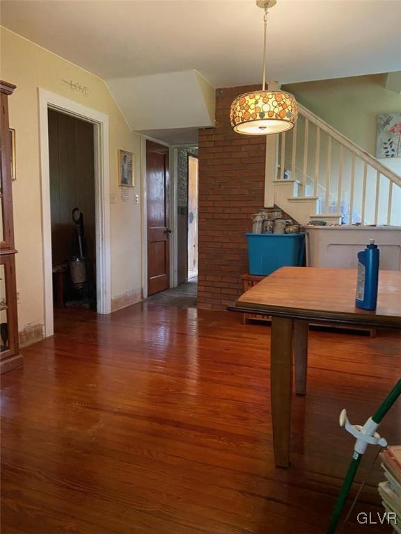 560 Cherry Hill Road Nazareth, PA 18064 - Photo 47 of 48 a view of a kitchen and dining room with wooden floor a chandelier