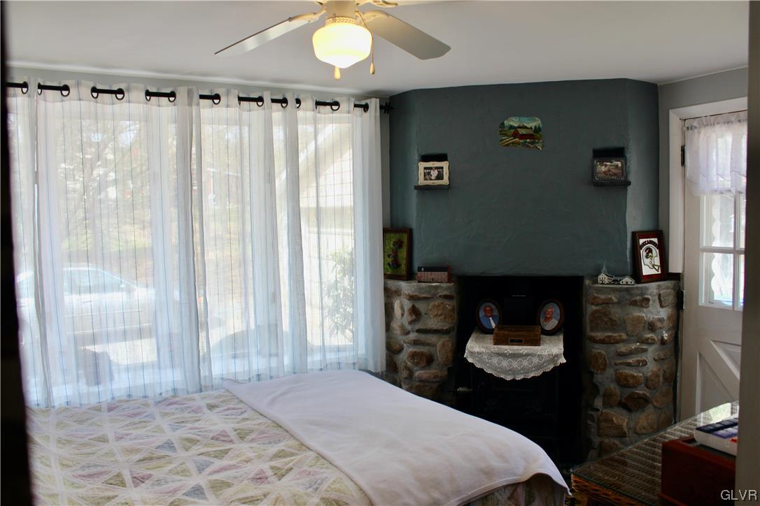 560 Cherry Hill Road Nazareth, PA 18064 - Photo 5 of 48 a bedroom with a bed and a window
