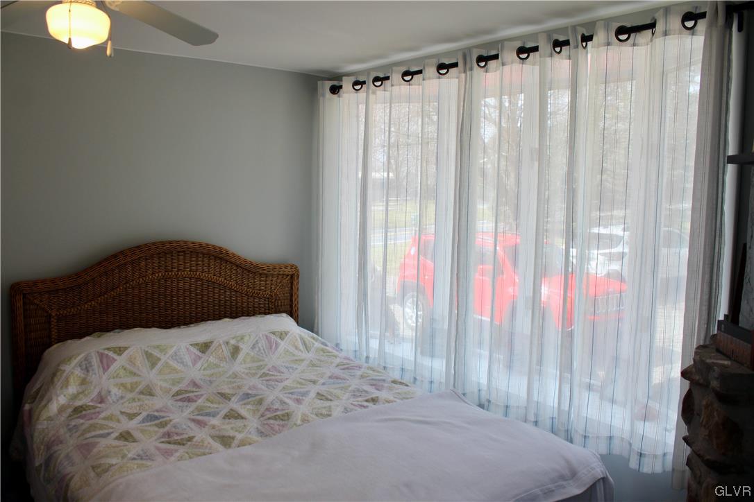 560 Cherry Hill Road Nazareth, PA 18064 - Photo 8 of 48 a bedroom with a bed and a chair