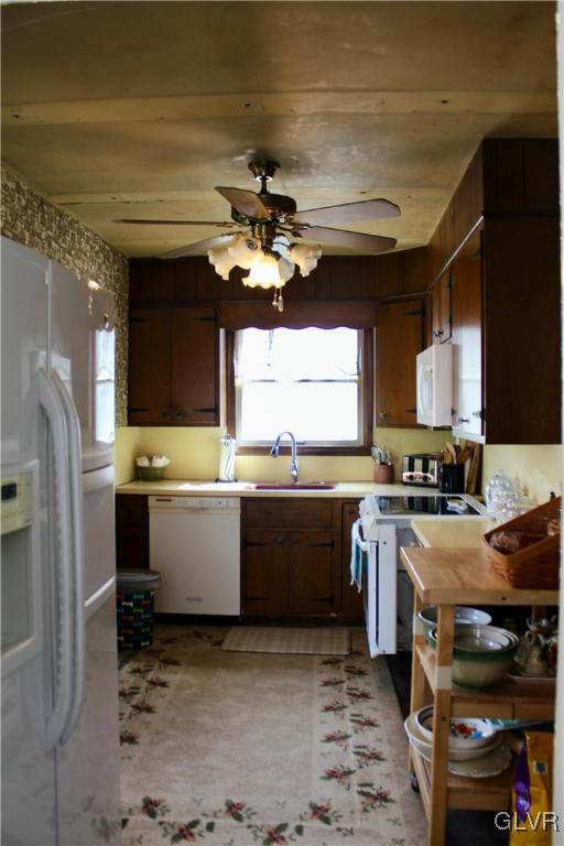 560 Cherry Hill Road Nazareth, PA 18064 - Photo 9 of 48 a kitchen with a stove a sink and a refrigerator