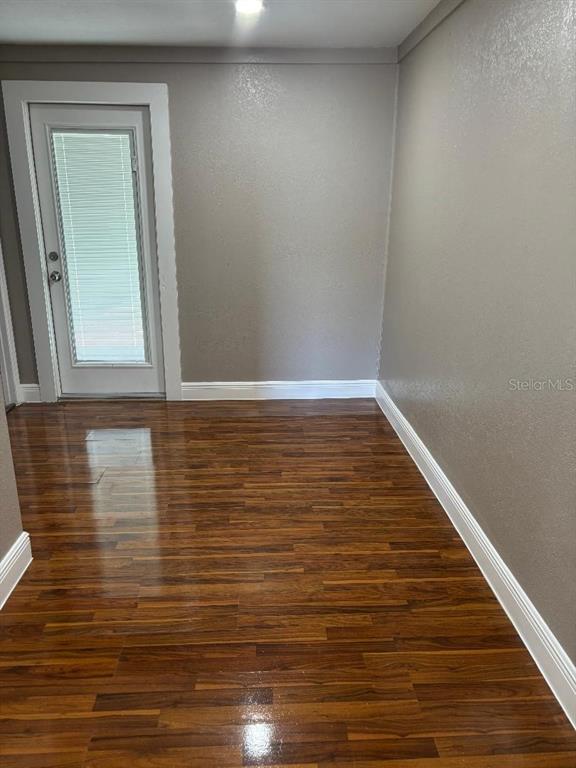 15827 Adobe Drive Hudson, FL 34667 - Photo 8 of 12 a view of wooden floor