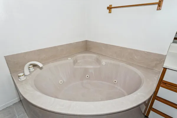 a view of a bathtub in a bathroom