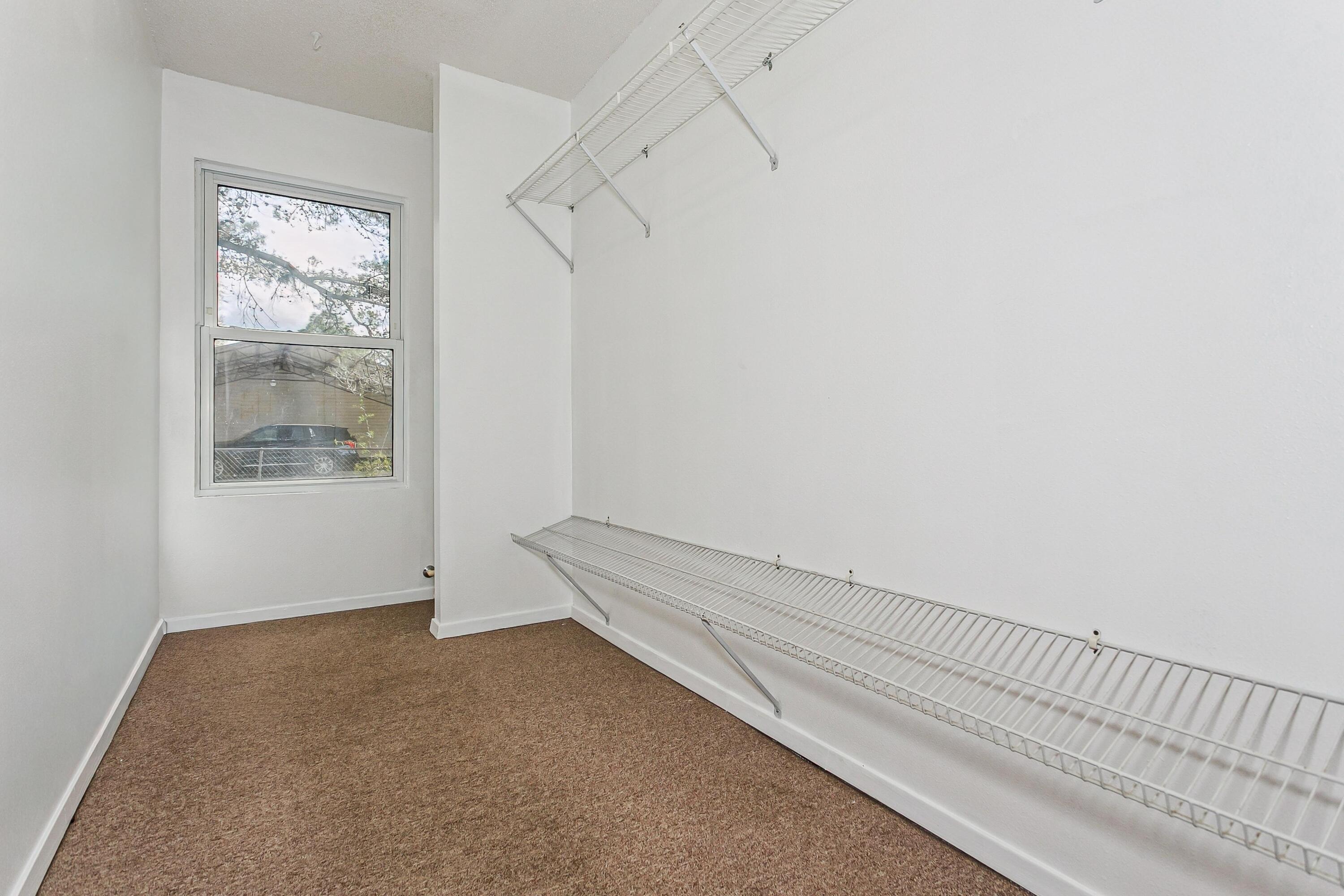 3146 Forrest Avenue Crestview, FL 32539 - Photo 26 of 47 a view of room with window and ceiling fan