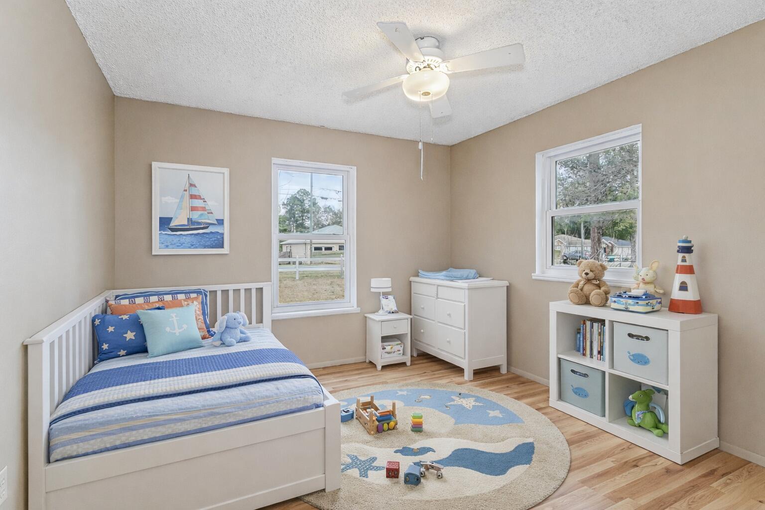 3146 Forrest Avenue Crestview, FL 32539 - Photo 27 of 47 a bedroom with furniture and a window