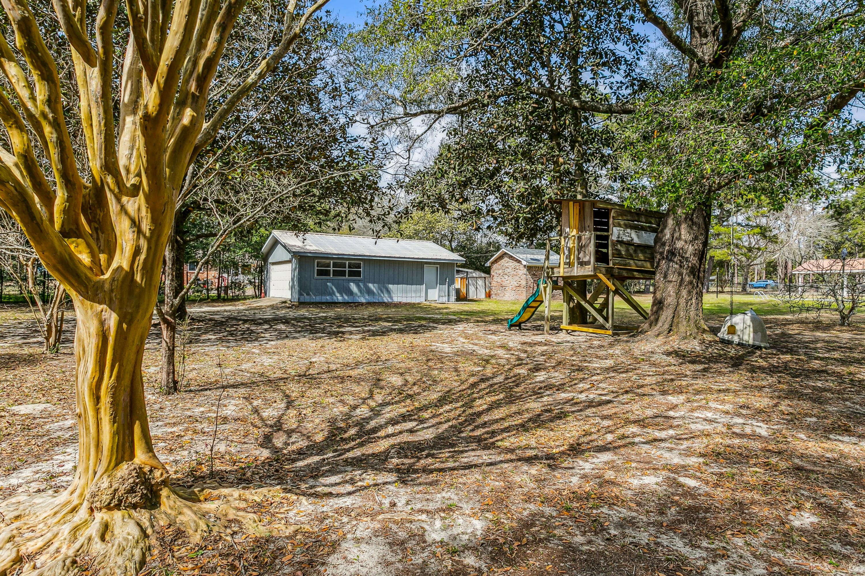 3146 Forrest Avenue Crestview, FL 32539 - Photo 40 of 47 a view of a house with a yard
