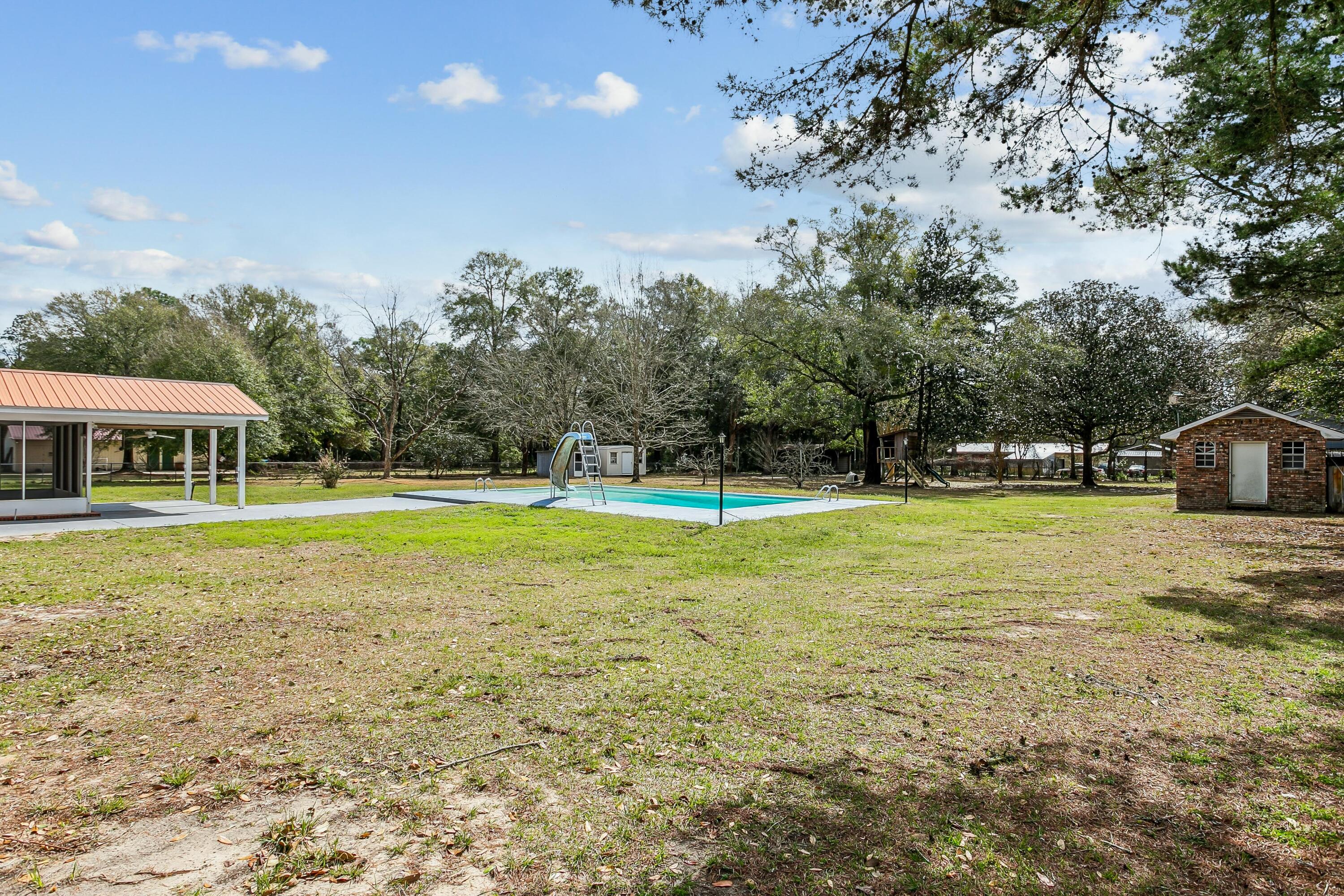 3146 Forrest Avenue Crestview, FL 32539 - Photo 45 of 47 a view of a house with a yard