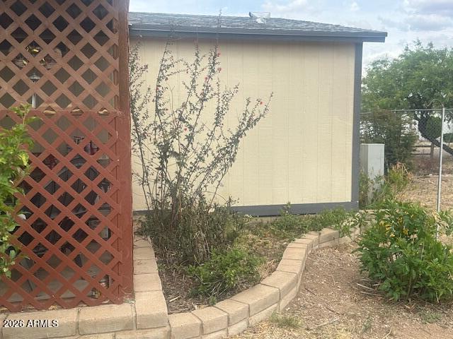 7258 South Lariat Road Hereford, AZ 85615 - Photo 30 of 37 a view of a yard with plants and wooden fence