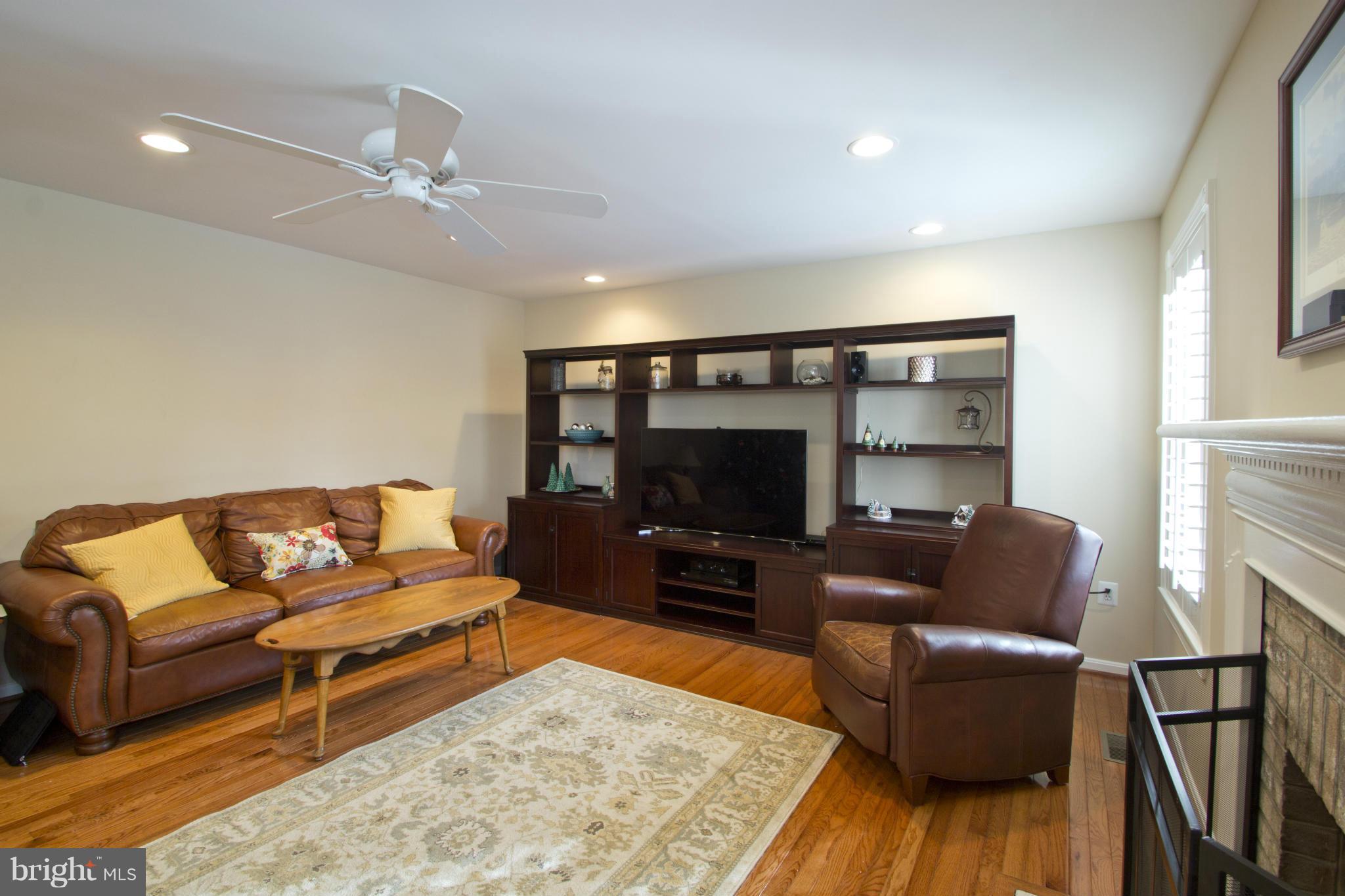 1518 Fenway Road Crofton, MD 21114 - Photo 14 of 30 Family Room with fireplace & hardwood flooring