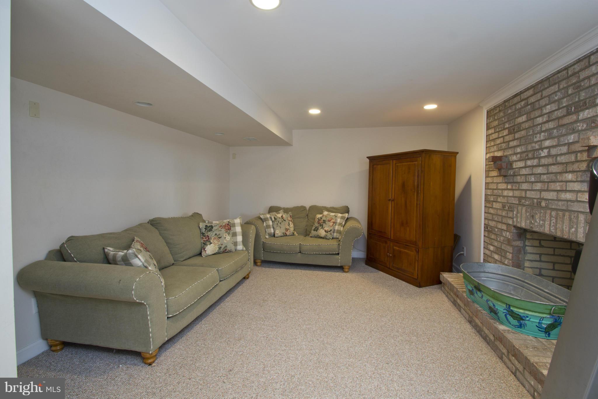 1518 Fenway Road Crofton, MD 21114 - Photo 24 of 30 Walk out lower level with fireplace