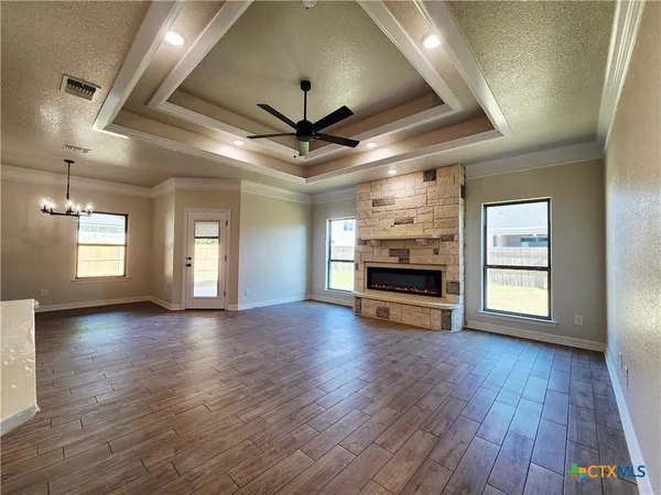 a kitchen with stainless steel appliances a sink and a refrigerator