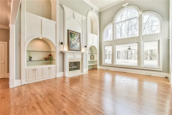 a view of a livingroom with wooden floor