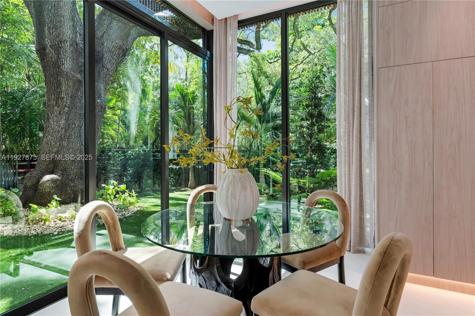 2800 Calusa Street Miami, FL 33133 - Photo 15 of 71 a view of a chairs and table in patio