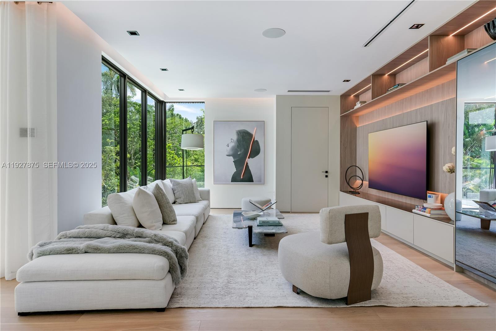 2800 Calusa Street Miami, FL 33133 - Photo 26 of 71 a living room with furniture and a large window