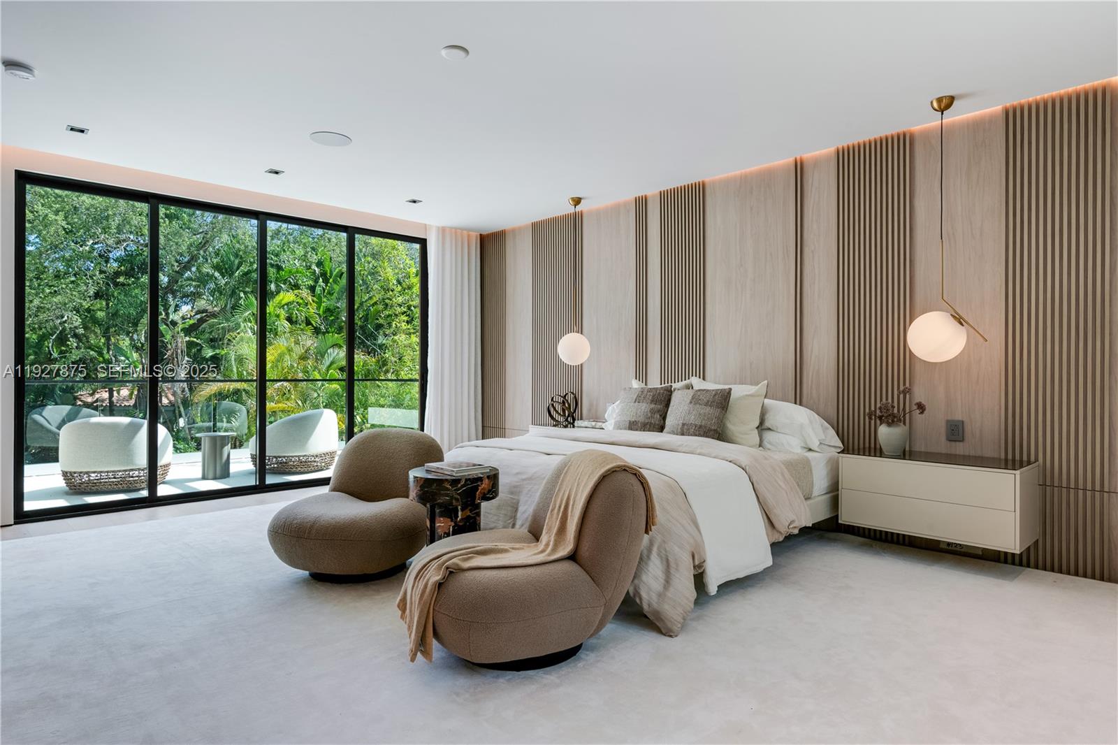 2800 Calusa Street Miami, FL 33133 - Photo 29 of 71 a spacious bedroom with bed and glass window