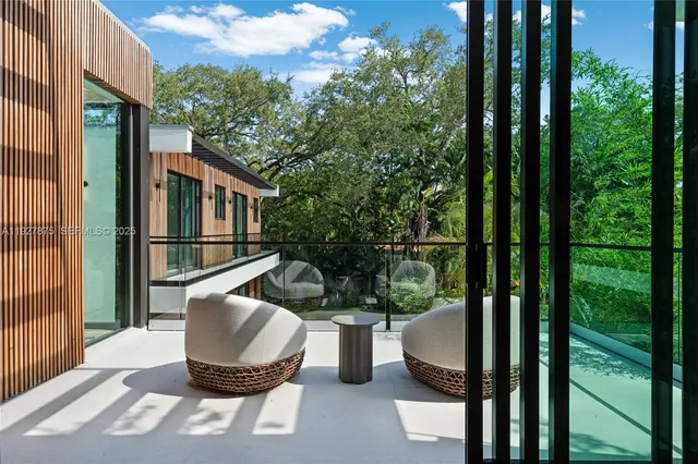 a bedroom with a bed and a mirror