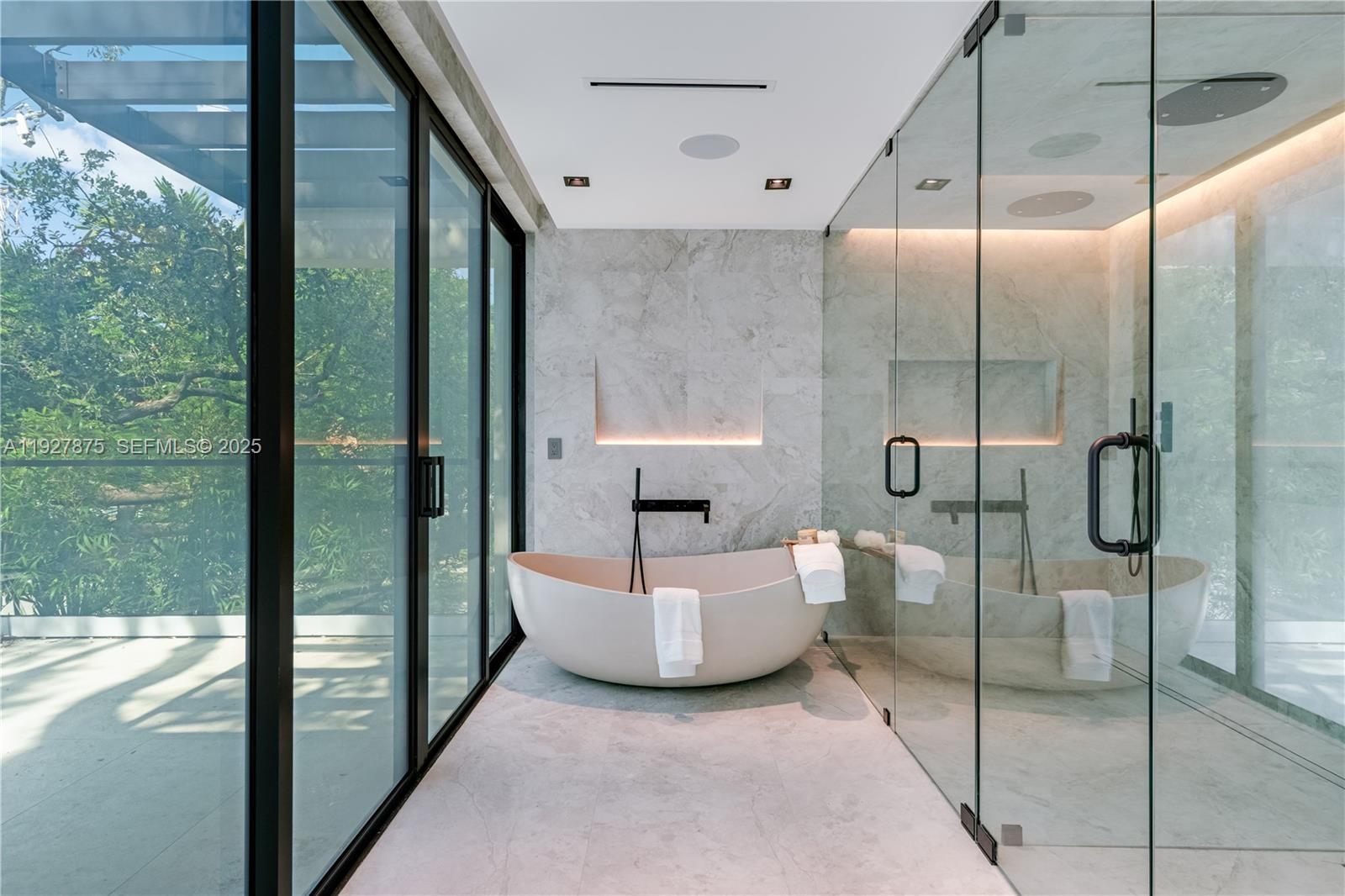 2800 Calusa Street Miami, FL 33133 - Photo 43 of 71 a bathroom with a shower and a sink