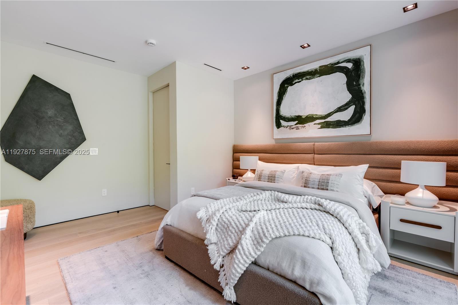 2800 Calusa Street Miami, FL 33133 - Photo 54 of 71 a bedroom with a bed and a flat screen tv