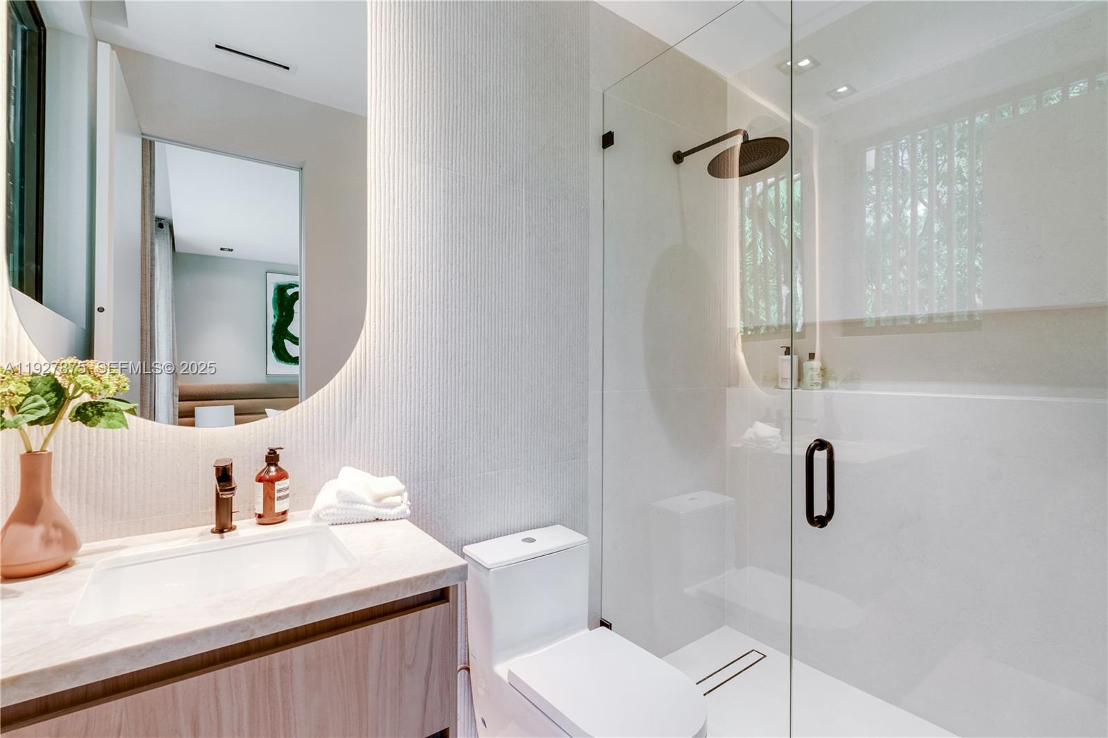 2800 Calusa Street Miami, FL 33133 - Photo 55 of 71 a bathroom with a sink toilet and shower