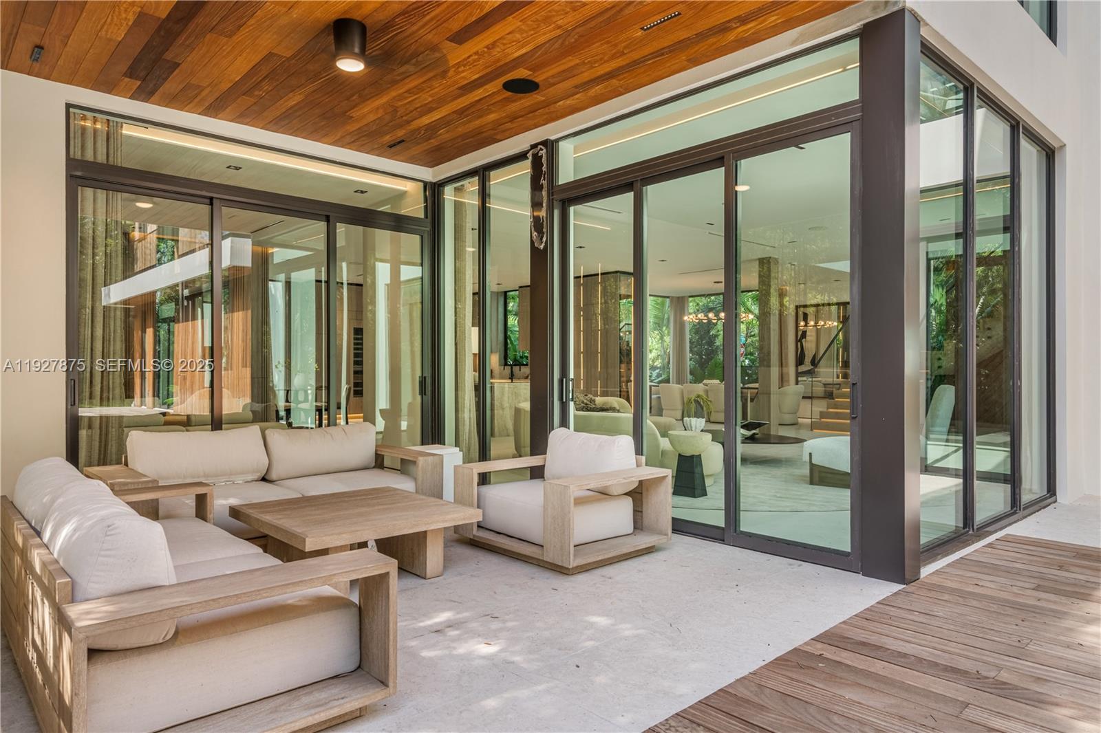 2800 Calusa Street Miami, FL 33133 - Photo 59 of 71 a living room with furniture and a large window