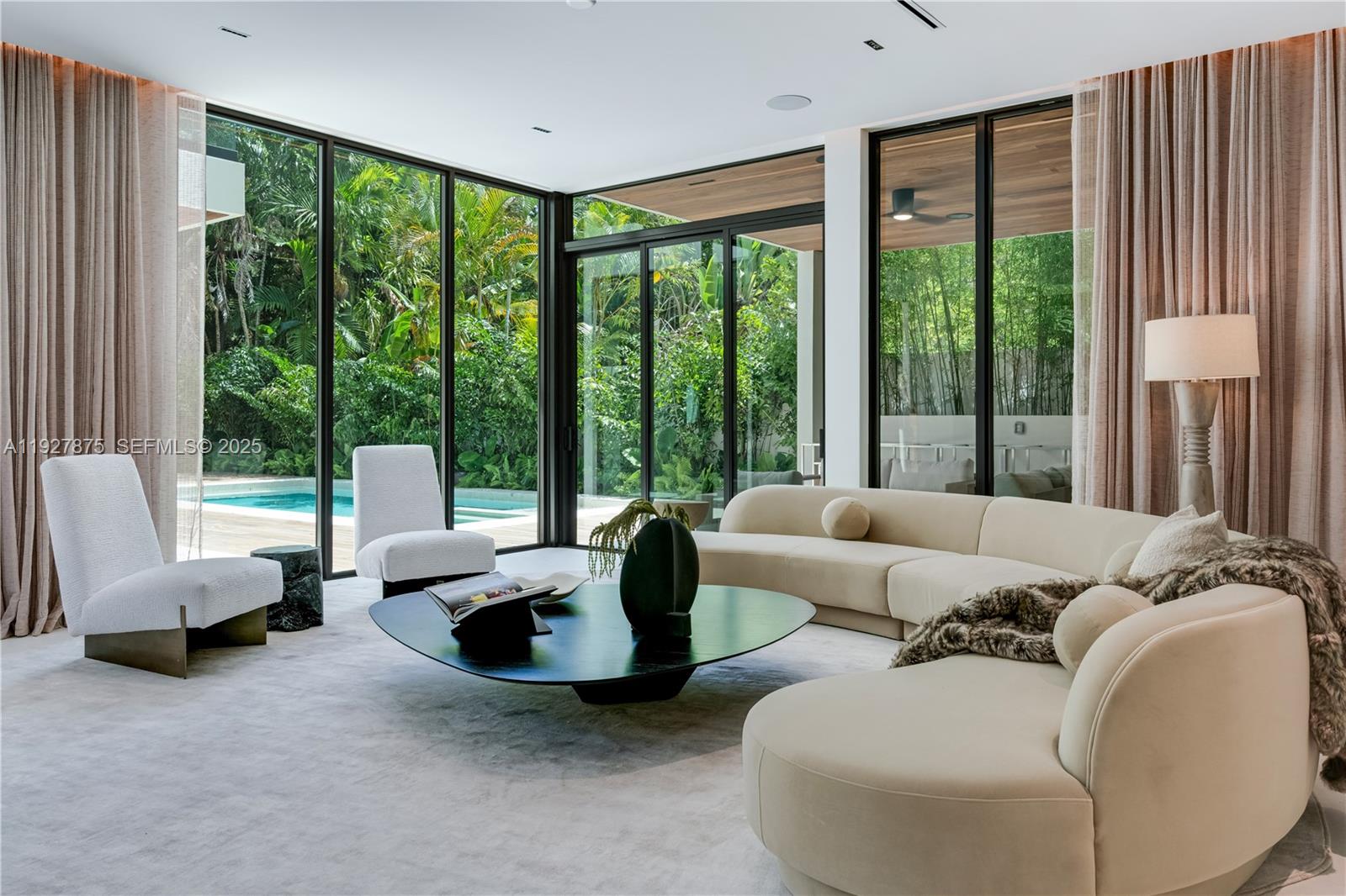 2800 Calusa Street Miami, FL 33133 - Photo 8 of 71 a living room with furniture and a large window