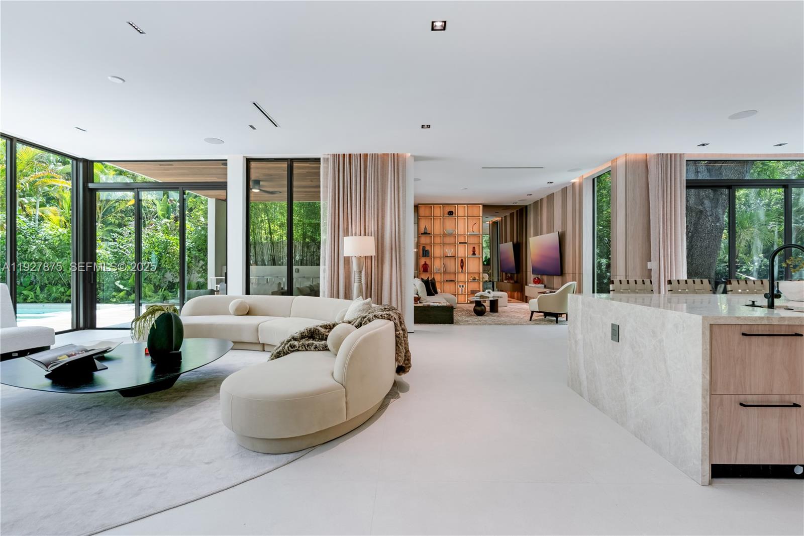 2800 Calusa Street Miami, FL 33133 - Photo 9 of 71 a living room with furniture and a large window