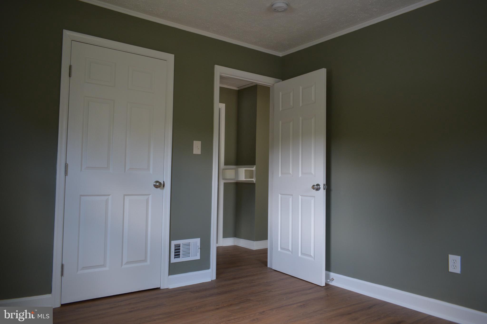 12323 Dewey Silver Spring Silver Spring, MD 20906 - Photo 16 of 37 an empty room with wooden floor & closet area