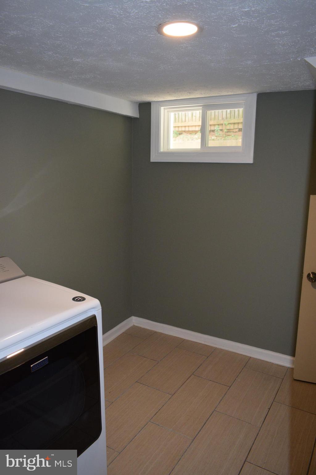 12323 Dewey Silver Spring Silver Spring, MD 20906 - Photo 34 of 37 a utility room with dryer and washer