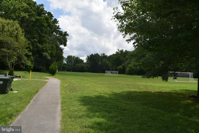 a view of a golf course with a garden