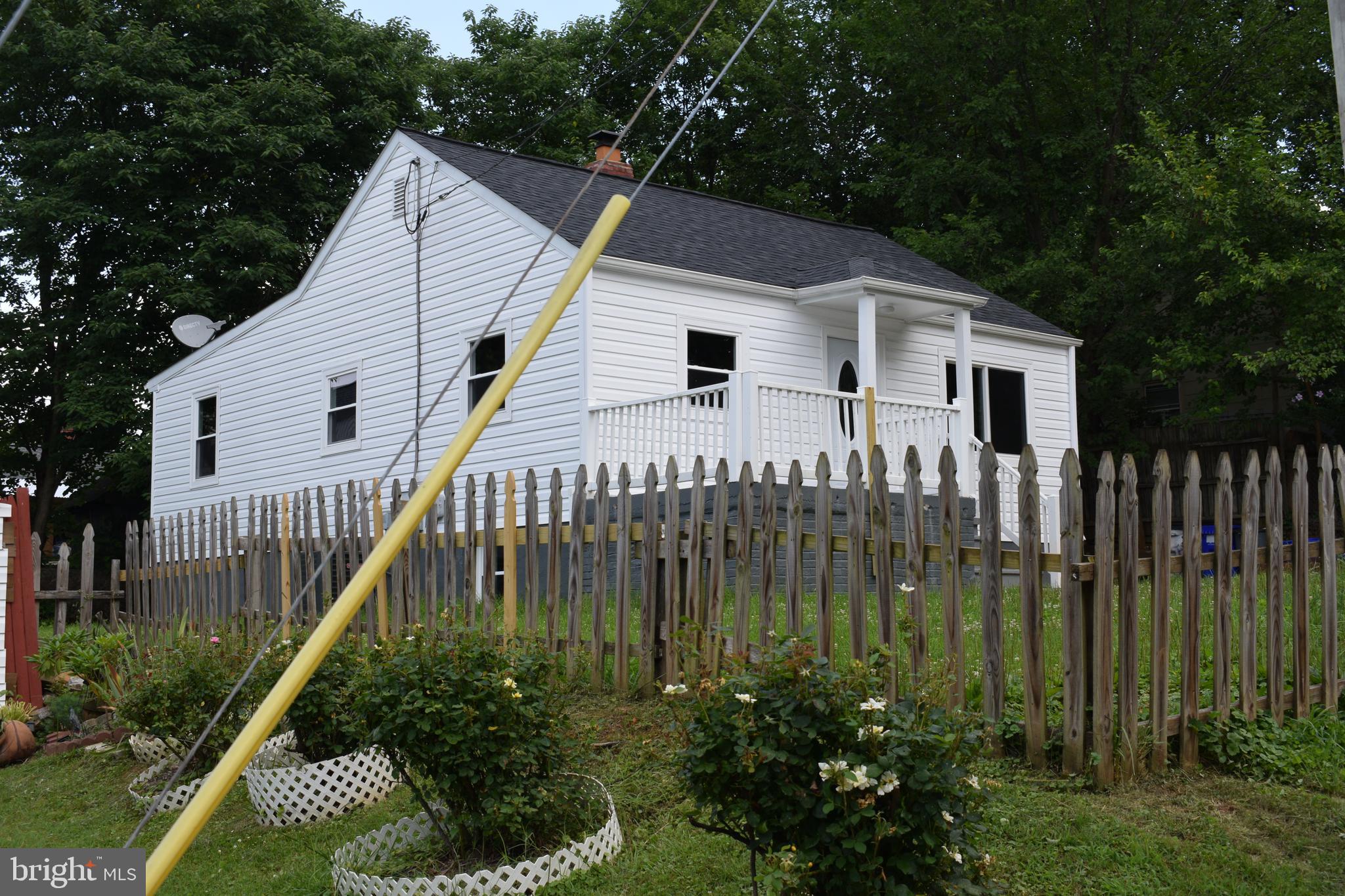 12323 Dewey Silver Spring Silver Spring, MD 20906 - Photo 4 of 37 a house view with a garden space