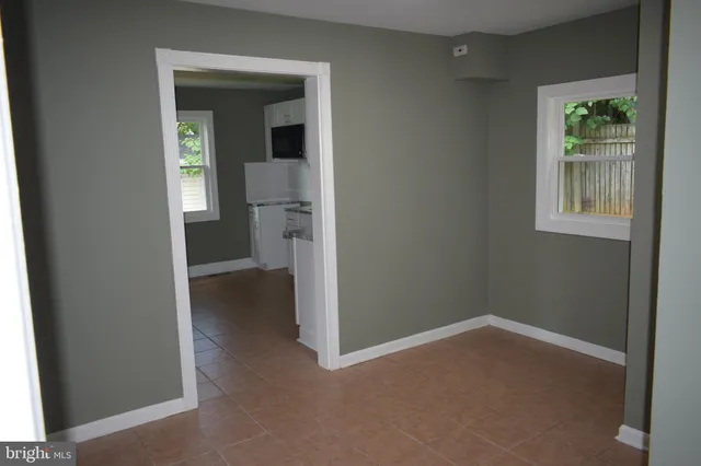 an empty room that has a window