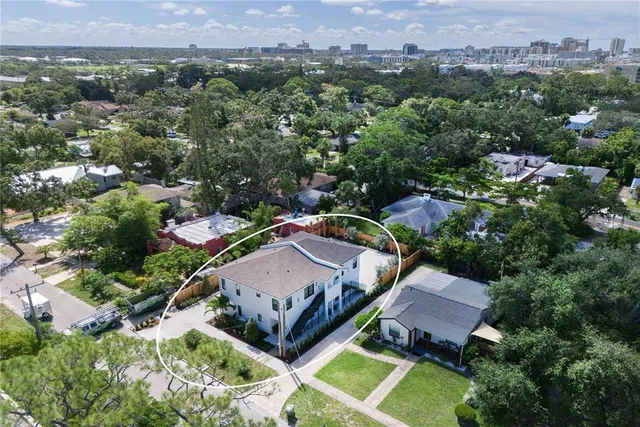 an aerial view of a house with a garden