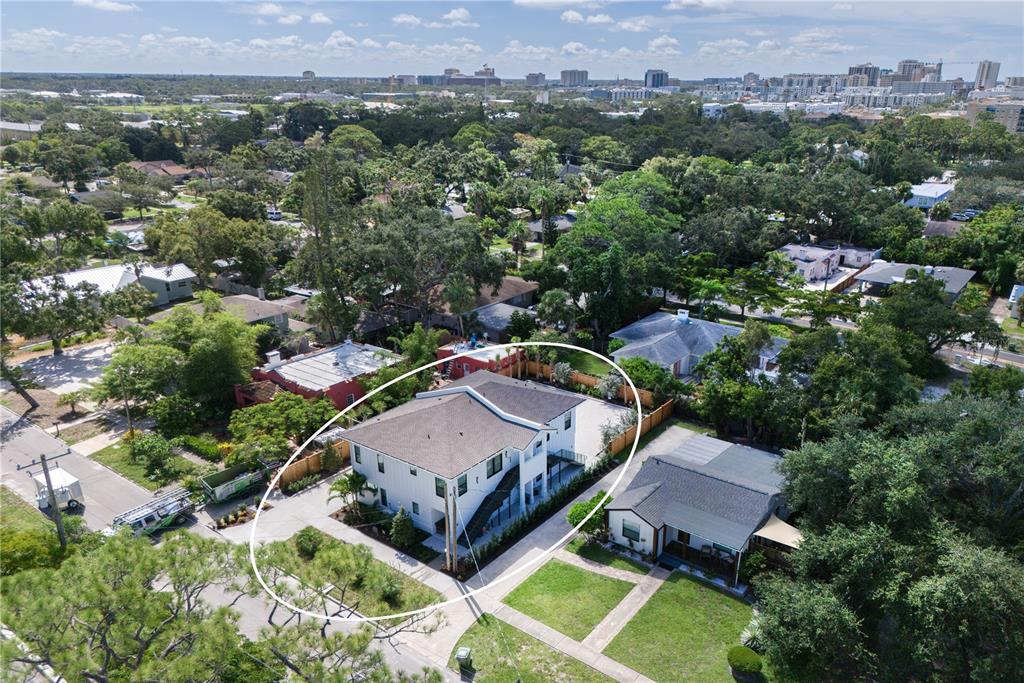 1234 15th Street, Unit 102 Sarasota, FL 34236 - Photo 1 of 30 an aerial view of a house with a garden