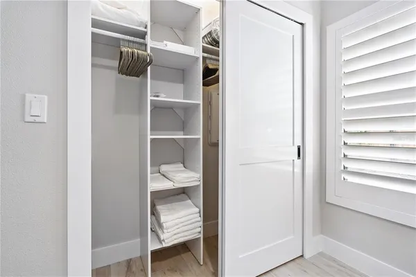 a view of a walk in closet