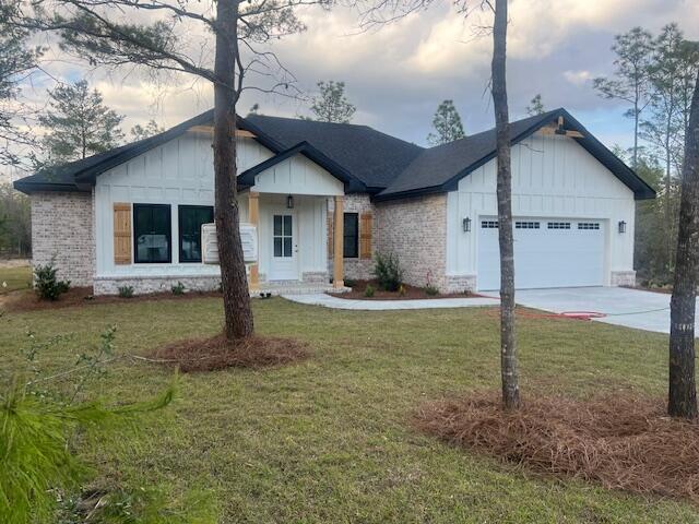 3968 High Ridge Road Crestview, FL 32539 - Photo 1 of 1 a view of a house with backyard and garden