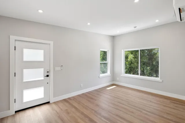 a kitchen with a refrigerator and a microwave
