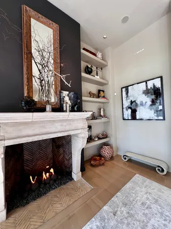 a room with furniture and a fireplace