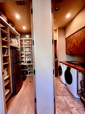 a view of a workspace with furniture