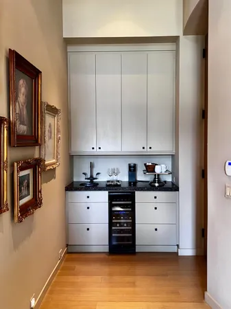 a kitchen with stainless steel appliances granite countertop a stove and a refrigerator