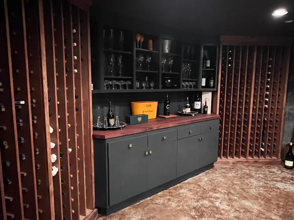 a kitchen with stainless steel appliances a refrigerator and microwave
