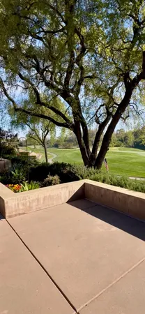 a view of a building with couches and a fireplace